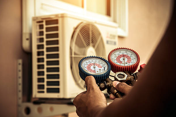 Professional Hvac technician working in Grapeville, PA